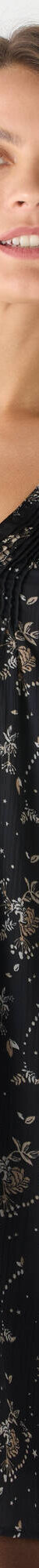 Robe bicolore à plis, imprimé feuilles (noir / beige) Robe bicolore à plis, imprimé feuilles (noir / beige)
